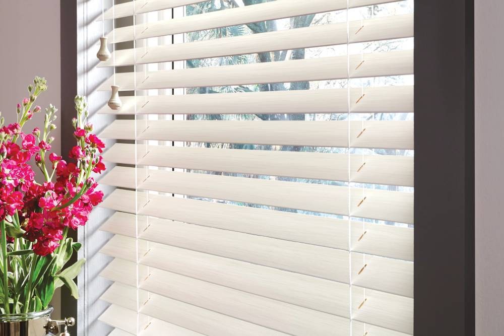 Hunter Douglas Parkland® Wood Blinds filtering light near Canoga Park, CA